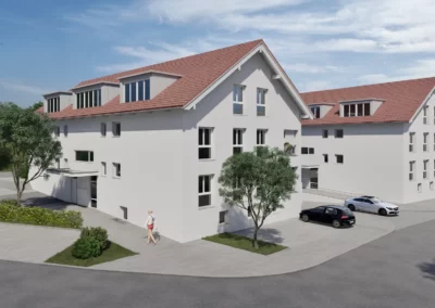 Moderne Wohnanlage Engel Areal in Erlangen, Gesamtansicht mit hellen Fassaden, rotem Dach und umliegendem Grünbereich bei Tageslicht