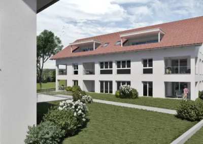 Nahaufnahme des Innenhofs der Wohnanlage Engel Areal in Erlangen, mit begrünten Flächen, Terrassen und der modernen Gebäudefassade